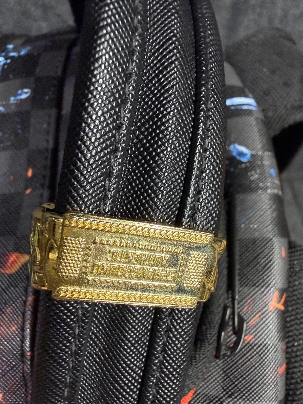 Sprayground Black Backpack with Orange Flame & Blue Ice Graphic